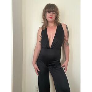 1970s 70s Frederick’s of Hollywood black jumpsuit plunge cleavage disco wide leg